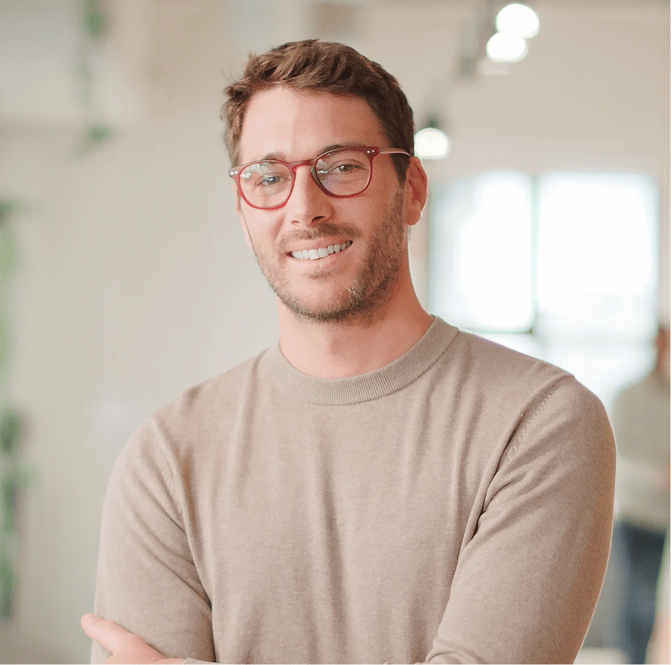 Smiling man with glasses – online psychiatry in Kent, WA